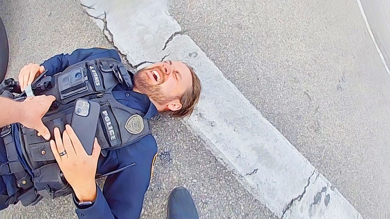 Officer Accidentally Runs into Police Car During Intense