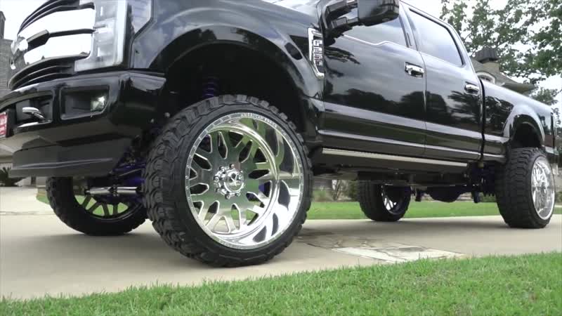 2017 F250 King ranch on 26x14 American Force Wheels and the BEST lift